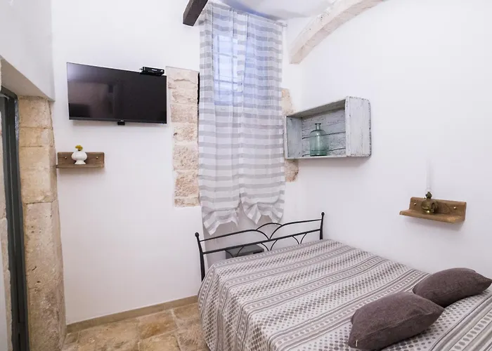 לינה וארוחת בוקר Arco Nicolaus פוטיניאנו